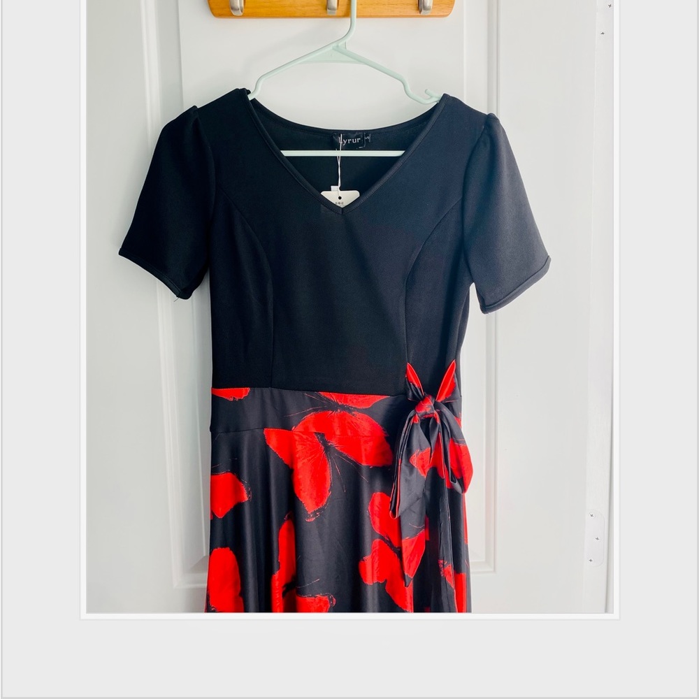 Black midi dress with red printed butterflies and side sash
